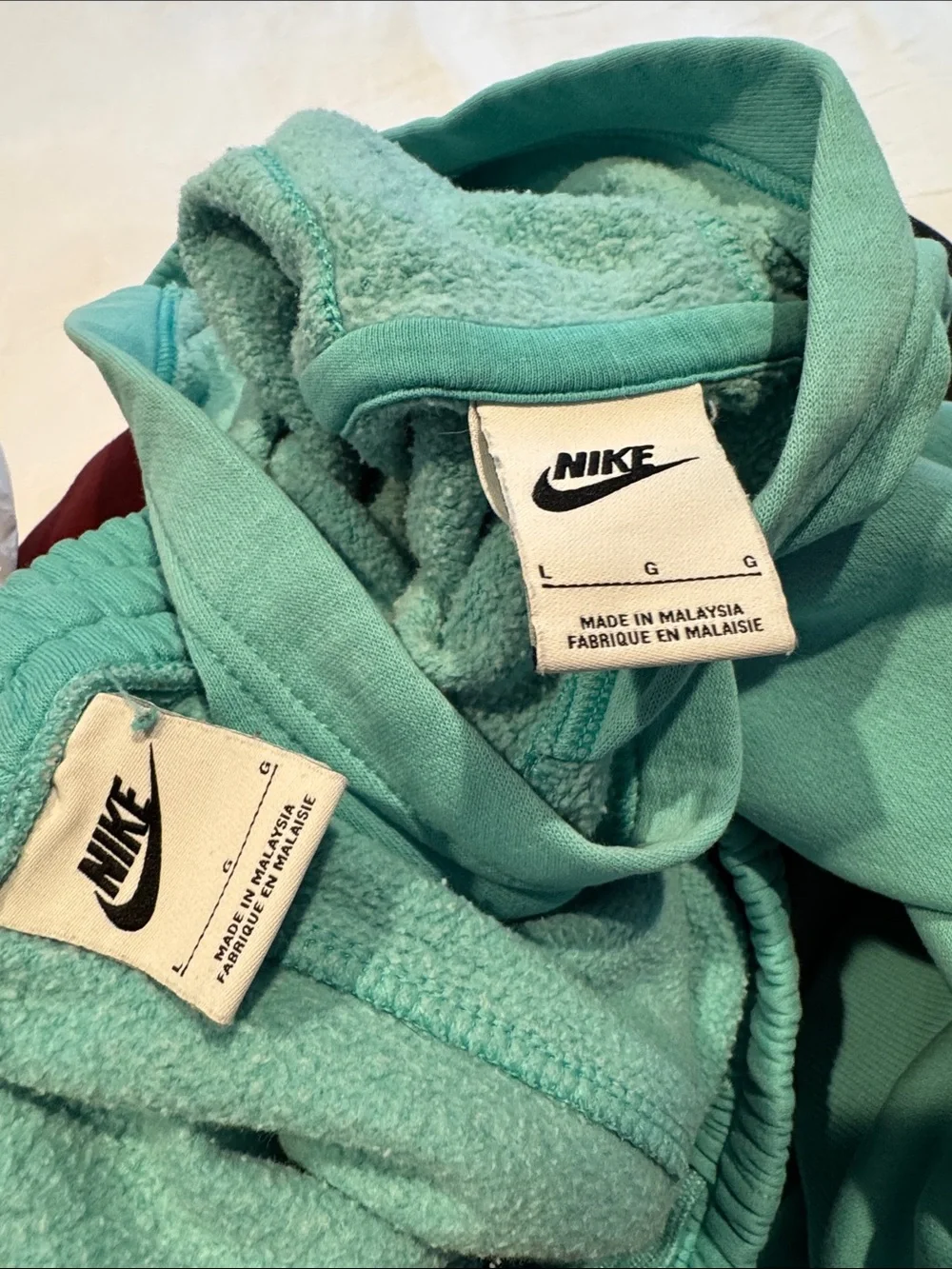 Nike Turquoise Pullover Hoodie and joggers with White Swoosh